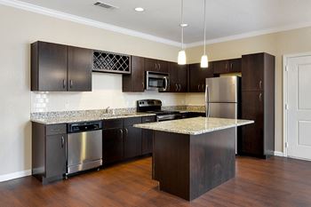 Concierge upgrades - stainless steel appliances, granite countertops, designer lighting, crown molding, framed mirrors, and more!